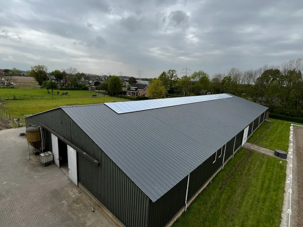Roof mounted with sandwich panels and a light ridge from above